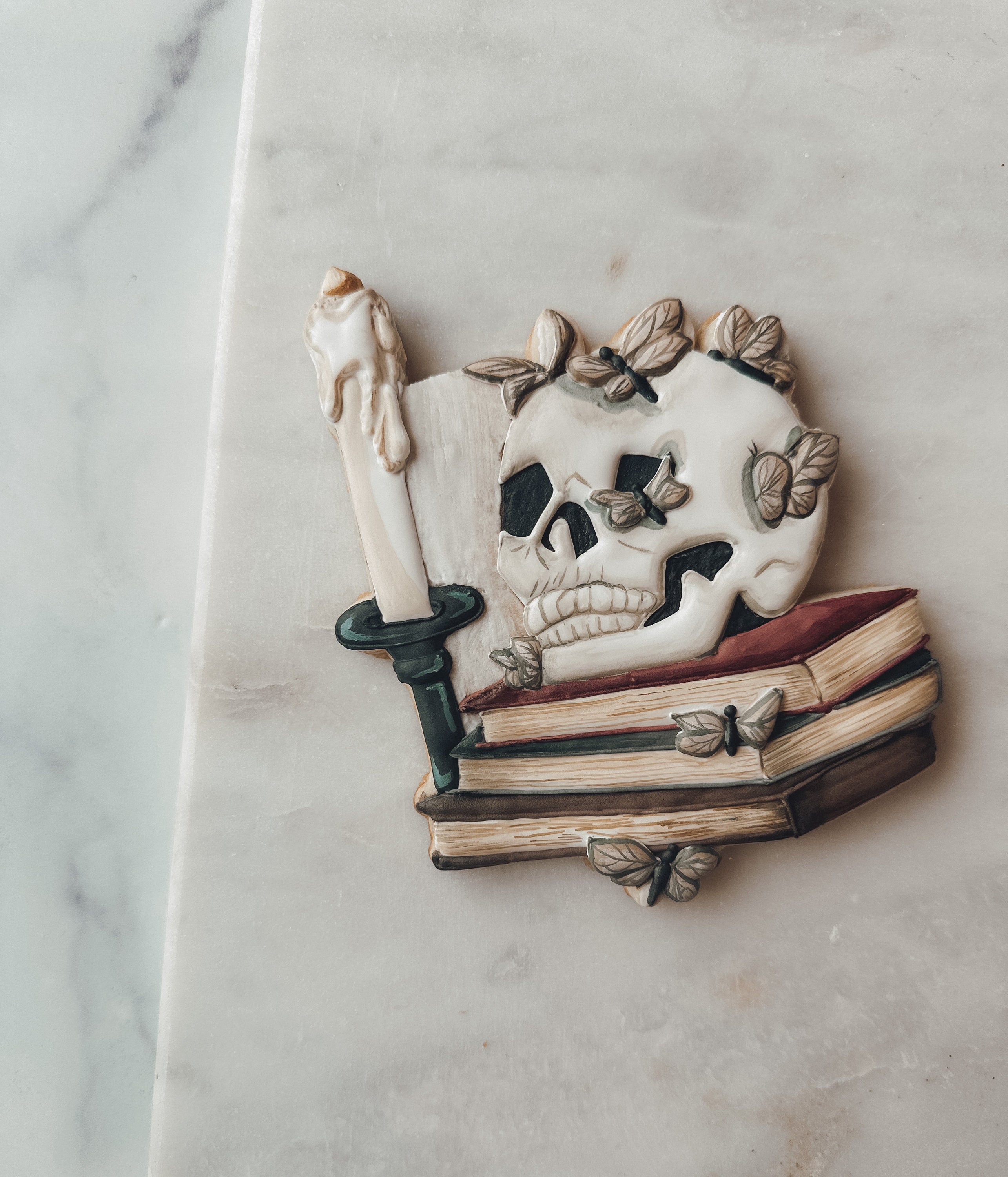 Halloween skull with butterflies and books cookie cutter